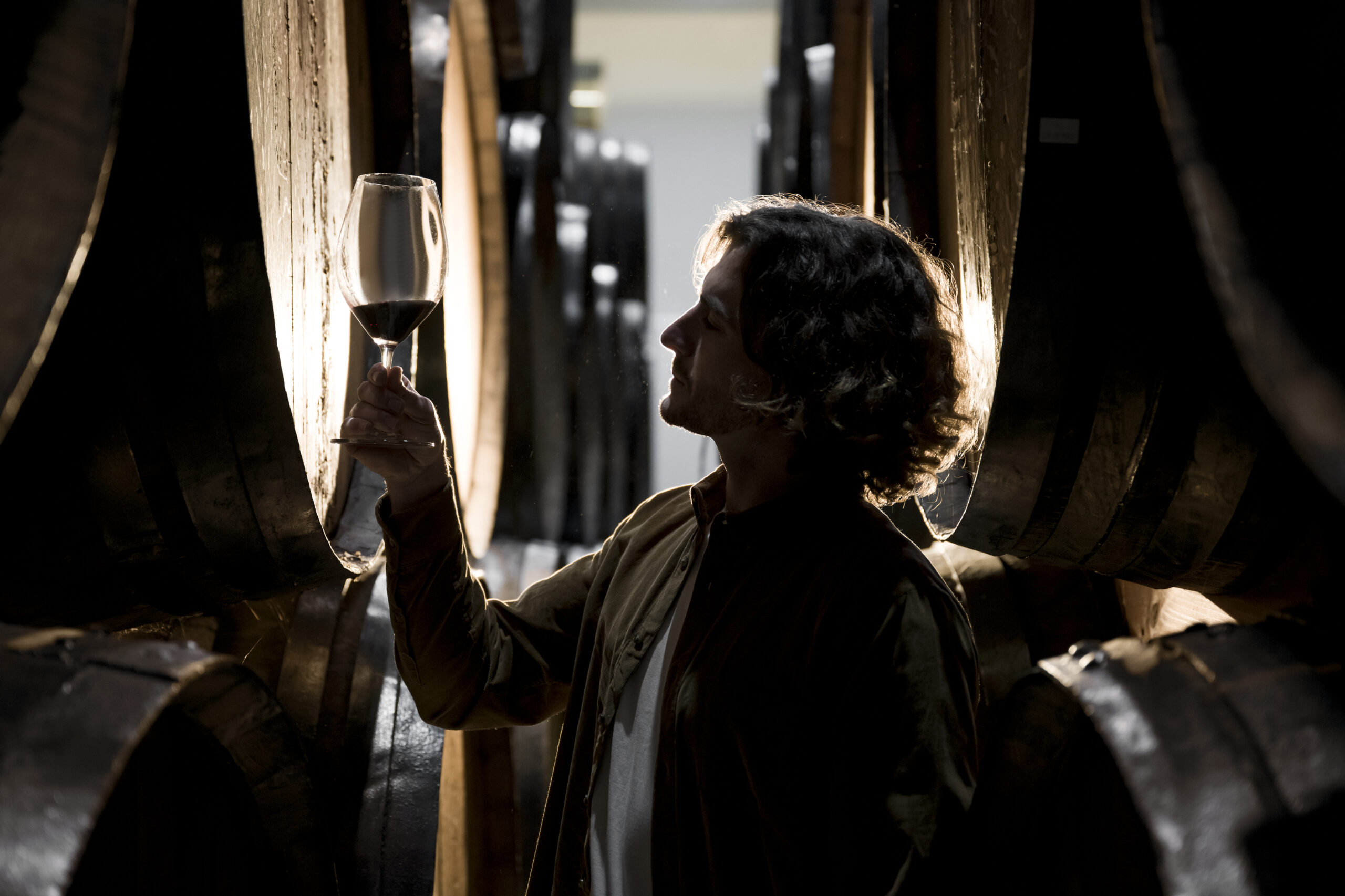 side-view-man-looking-wine-glass side-view-man-looking-wine-glass